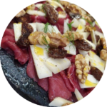 Carpaccio d'autunno - carpaccio di girello di fassona marinato con Ambra Liquida, fichi semi secchi, scaglie di pecorino, melograno e noci_Geri